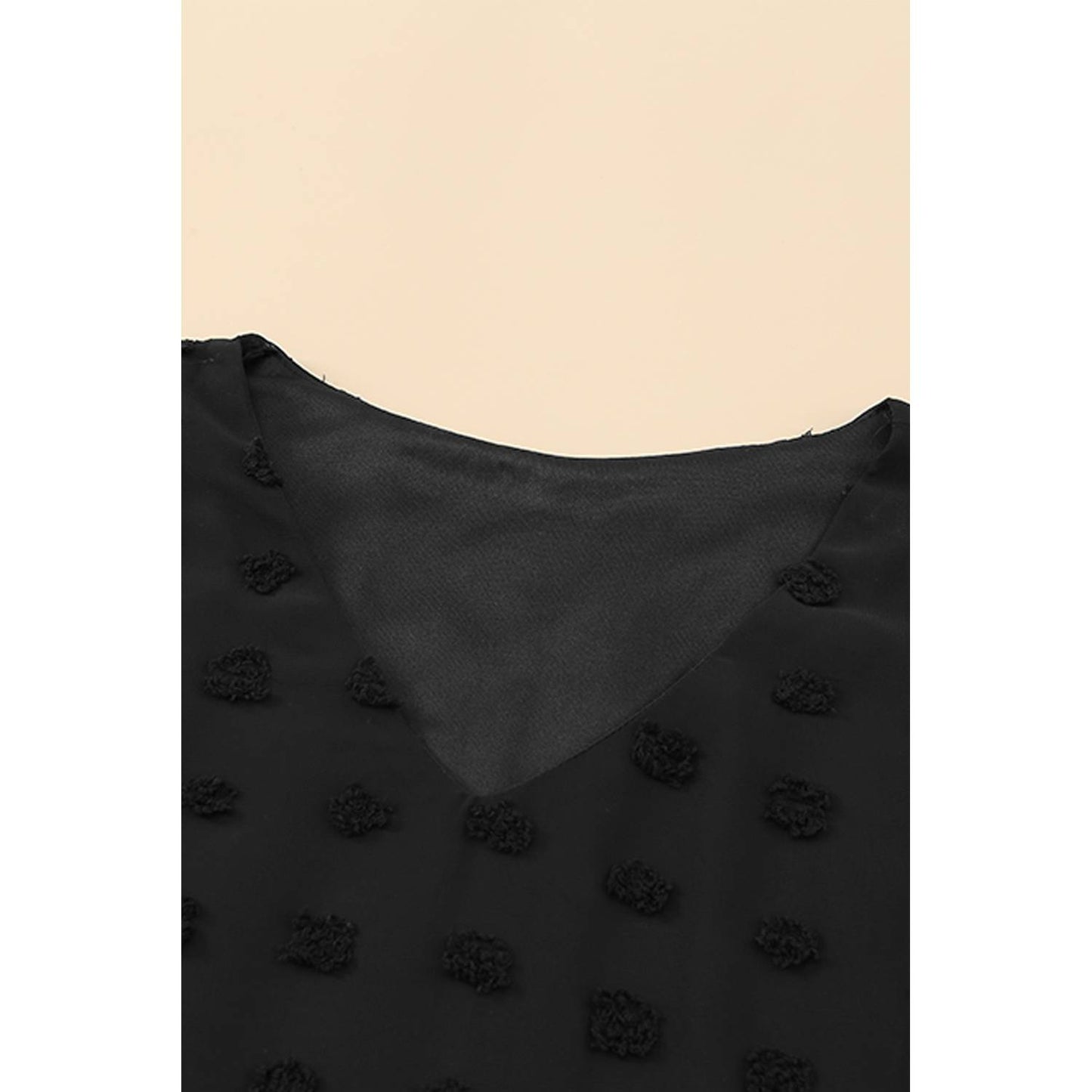 Blusa negra lunares texturados