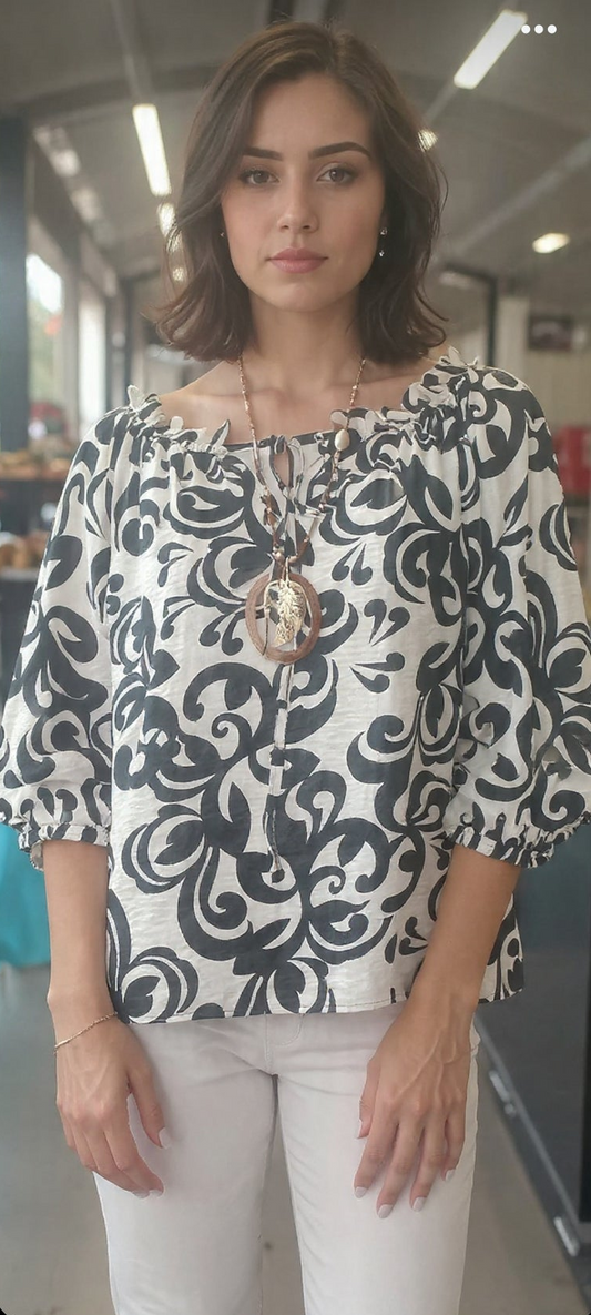 Top oversize de hombros descubiertos